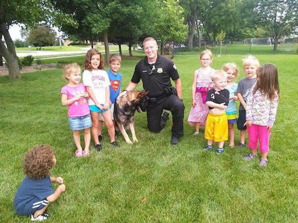 A Police Officer Approaches A Group Of Kids With An Urgent Request That ...