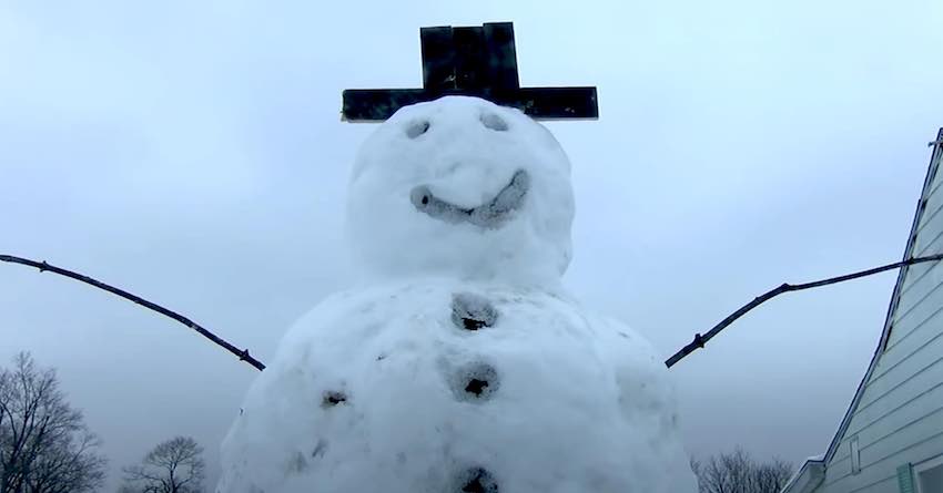 Driver Tries To Run Over 9 Foot Snowman Gets Instant Karma Instead